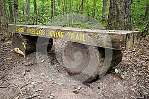 Simple wooden bench with inscription marking the starting point of the Laurel Highlands Hiking Trail near Johnstown, Pennsylvania