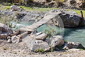 Simple wooden bridge across the Urech River