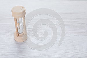 Simple wooden egg timer measuring passing time