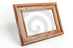 Wooden frame isolated on white background photo
