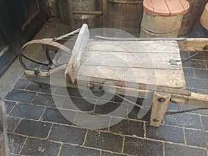 Simple wooden wheelbarrow from 19th century II photo