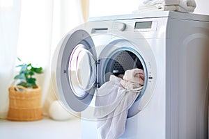 Simplifying housework: washing machine and apparel pile