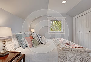 Simply furnished Attic bedroom interior