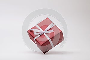 Simply red gift box on white background