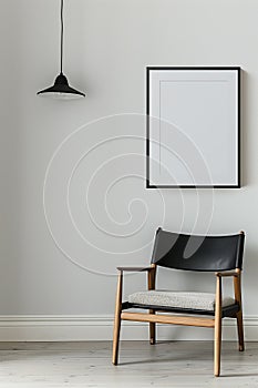 The simulation of a black frame with a white coating contrasts with the plain white wall. and simple furniture