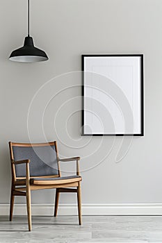 The simulation of a black frame with a white coating contrasts with the plain white wall. and simple furniture