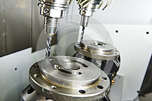 Simultaneous synchronous metal machining by mill on multi tool CNC machine photo