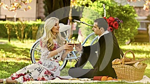 Sincere emotions. happy couple in love. woman and man lying in park and enjoying day together. valentines day picnic