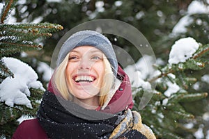 Sincere emotions. Woman blond hair smiling snowy winter nature background. Christmas and new year. Model tender girl