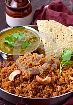 Sindhi thali meal - Sai bhaji papad and tairi rice