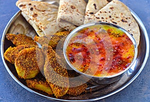 Indian vegan meal - roti curry and dry vegetables