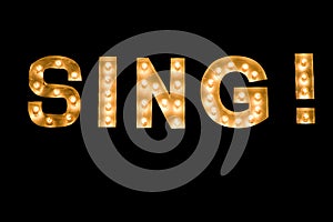 SING! lit sign, close-up lights, full frame background