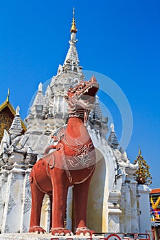 Singa statue at the door, Wat Phrathat Hariphunchai