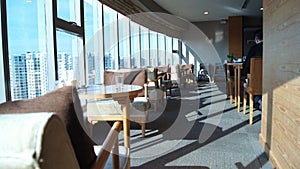 SINGAPORE - APR 2nd 2015: Lounge area of a hotel, club, company lobby. Fragment of the modern lobby with skyline view of