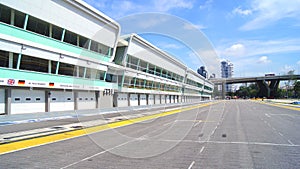 SINGAPORE - APR 2nd 2015: Pit lane and start finish line of the Formula One Racing track at Marina Bay Street Circuit
