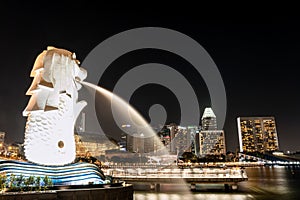 Singapore - Aug 23, 2019 : Night city view of Landmark at the marina in singapore with merlion statue fountain in merlion park