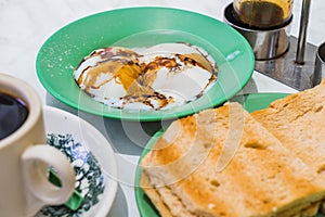 Singapore Breakfast Kaya Toast, Coffee bread and Half-boiled egg