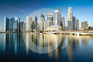 Singapore business district skyline financial downtown building with tourist sightseeing in morning at Marina Bay, Singapore.