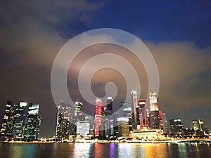 Singapore city skyline at dusk with Marina bay.