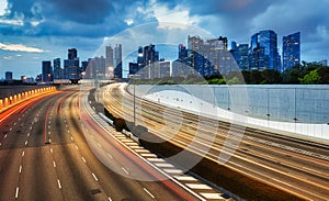 Singapore cityscape skyline during sunset with traffic - Transportation