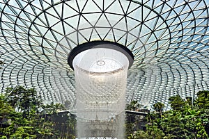 SINGAPORE - December 22, 2019: The largest indoor waterfall inside Jewel Changi Airport in Singapore