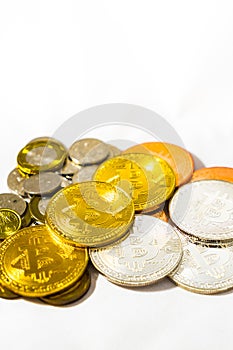 Singapore Dollar coins and Bitcoins Cryptocurrency coins on Whit