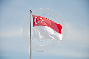 Singapore flag blowing in wind