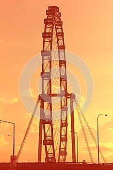 Singapore flyer at sunset