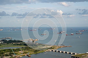 Anchorage area panorama opposite Gardens by the Bay with many ships on an anchorage