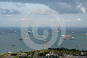 Anchorage area panorama opposite Gardens by the Bay with many ships on an anchorage