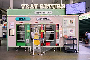 Singapore Oct2020 Tray return sorting station, halal and non-halal, at Yishun Park hawker centre. Diners at coffee shops, food