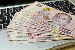 Singapore One Thousand Dollars Currency Notes on Computer