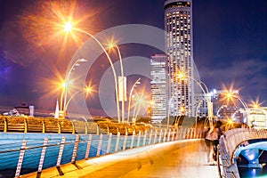 SINGAPORE, SINGAPORE - MARCH 2019: Esplanade bridge and downtown core skyscrapers in the background Singapore