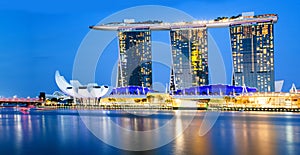 SINGAPORE, SINGAPORE - MARCH 2019: Skyline of Singapore Marina Bay at night with Marina Bay sands, Art Science museum ,