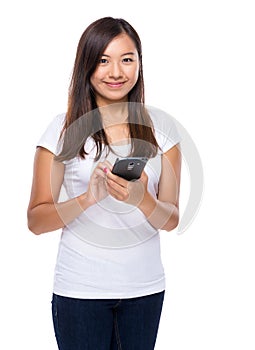 Singaporean woman use of mobile phone