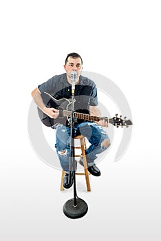 Singer Acoustic Guitarist on White Looking forward