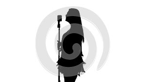 Singer holds the microphone. White. Silhouette