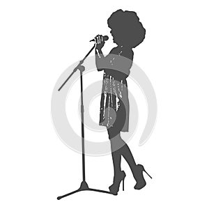 Singer with a microphone. Vector silhouette for creative and thematic design