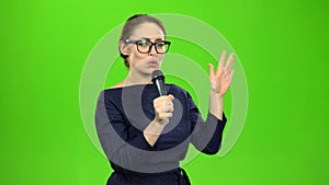 Singer performs a song. Green screen