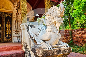 The Singha lion sculpture at the Viharn of Wat Pratu Pong, Lampang, Thailand