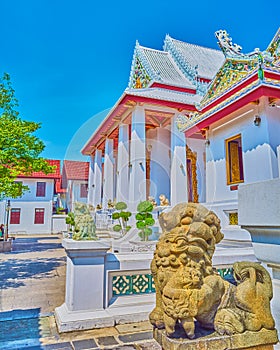 Singha stone guardian in Wat Bowonniwet Vihara temple, Bangkok, Thailand