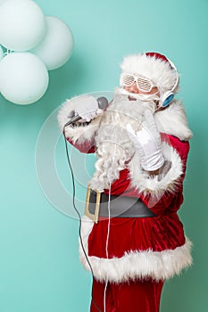 Singing and dancing Santa