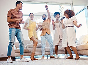Singing, entertainment and friends dancing in living room with a microphone to music, playlist or radio. Happy