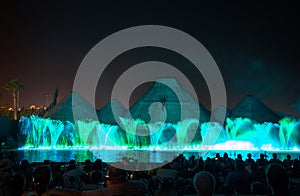 Singing fountains. Glowing colored fountains and laser show.