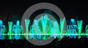 Singing fountains. Glowing colored fountains and laser show.