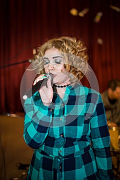 Singing girl with microphone