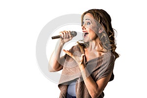 Singing woman speaking into microphone