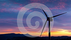 Single 3d animated wind turbine with sunrise time lapse. Turbine is 3d Rendered Illustration.