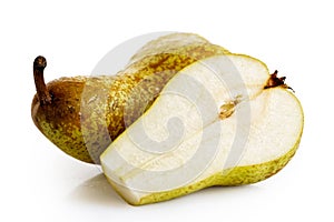 Single abate fetel pear next to a half of pear isolated on white