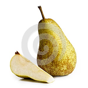 Single abate fetel pear next to a slice of pear isolated on whit